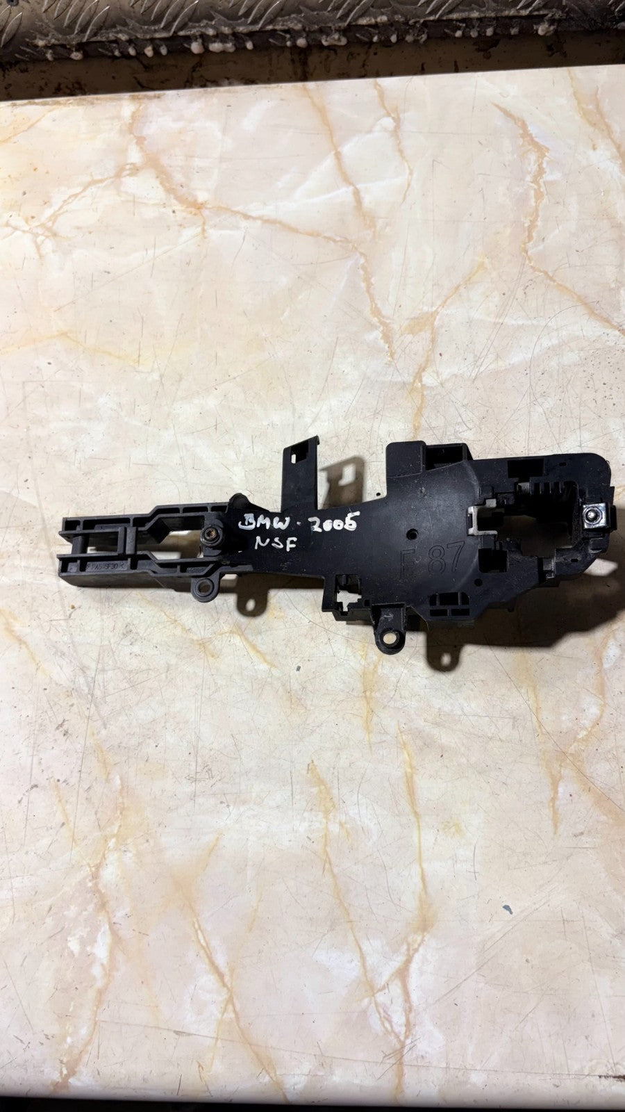 Bmw 2005 N/S/F Door Handle Bracket Passengers Front Left