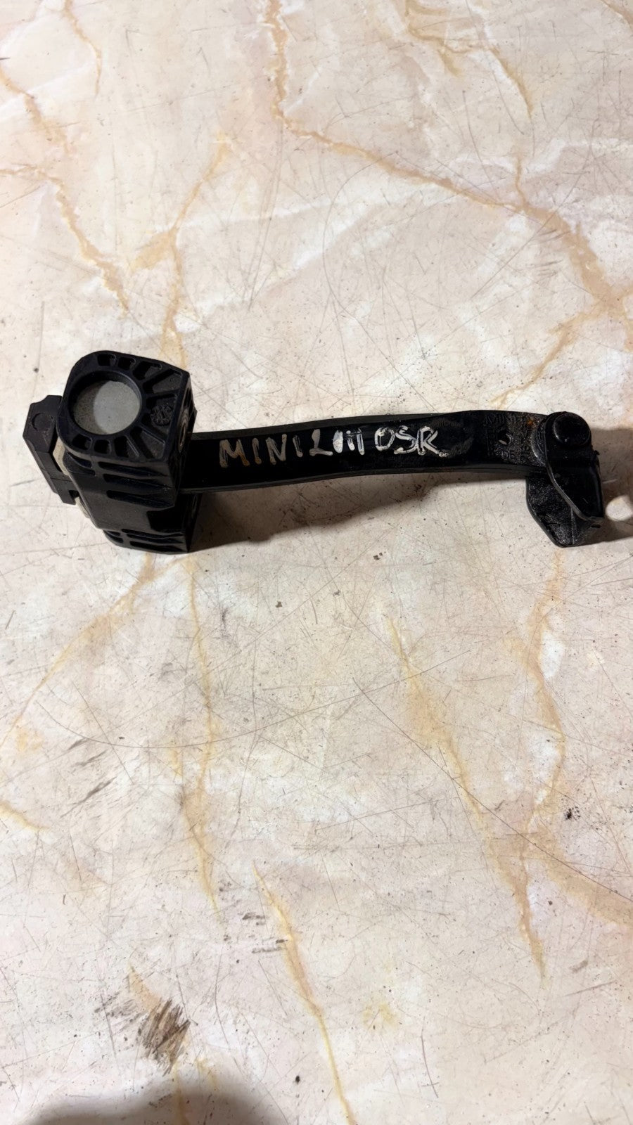 MINI 2011 DRIVER SIDE REAR DOOR CHECK STRAP STOPPER