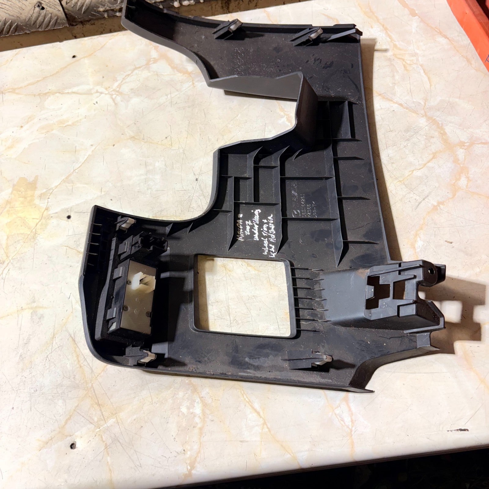 MAZDA 2 2007 UNDER STEERING WHEEL TRIM AND LIGHT ADJUSTER D65164261