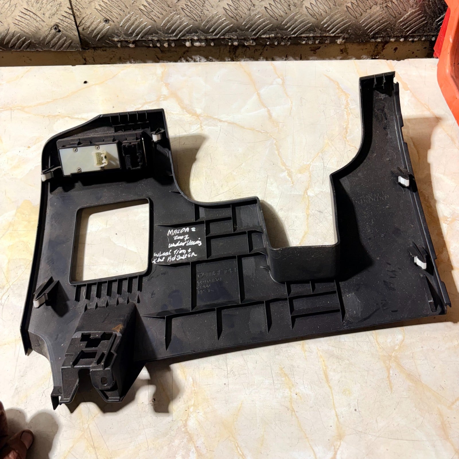 MAZDA 2 2007 UNDER STEERING WHEEL TRIM AND LIGHT ADJUSTER D65164261
