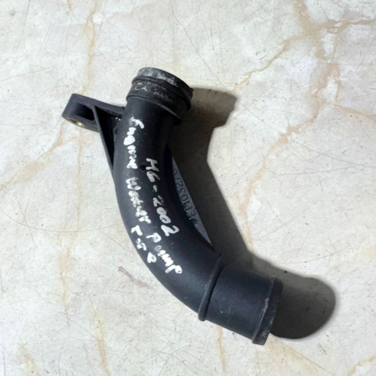 MG 2002 ENGINE WATER PUMP PIPE