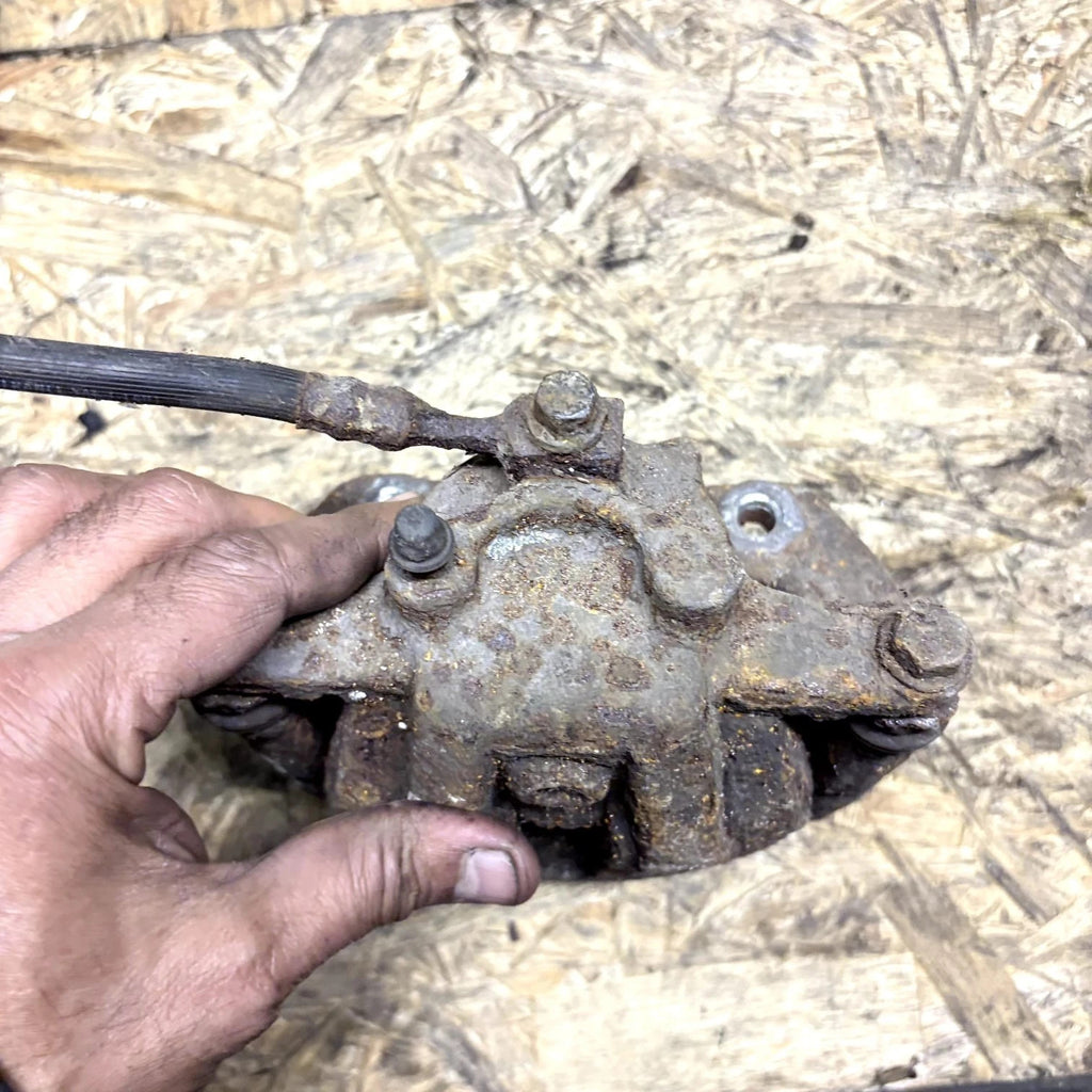 Nissan Note E11, NE11 Driver Side Brake Caliper 14390260