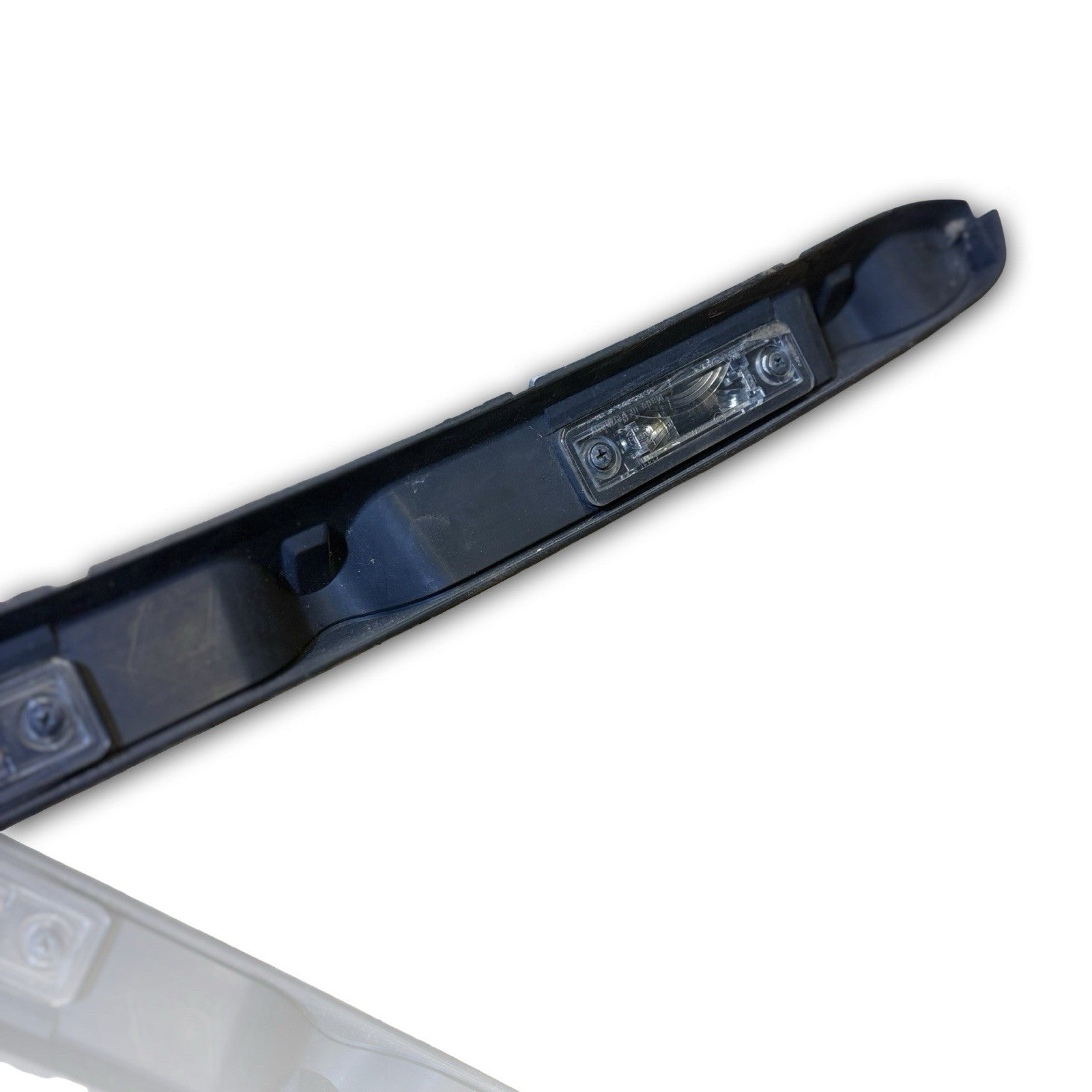 VAUXHALL COMBO 2001-2011 REAR NUMBER PLATE LIGHT TRIM STRIP 9228482
