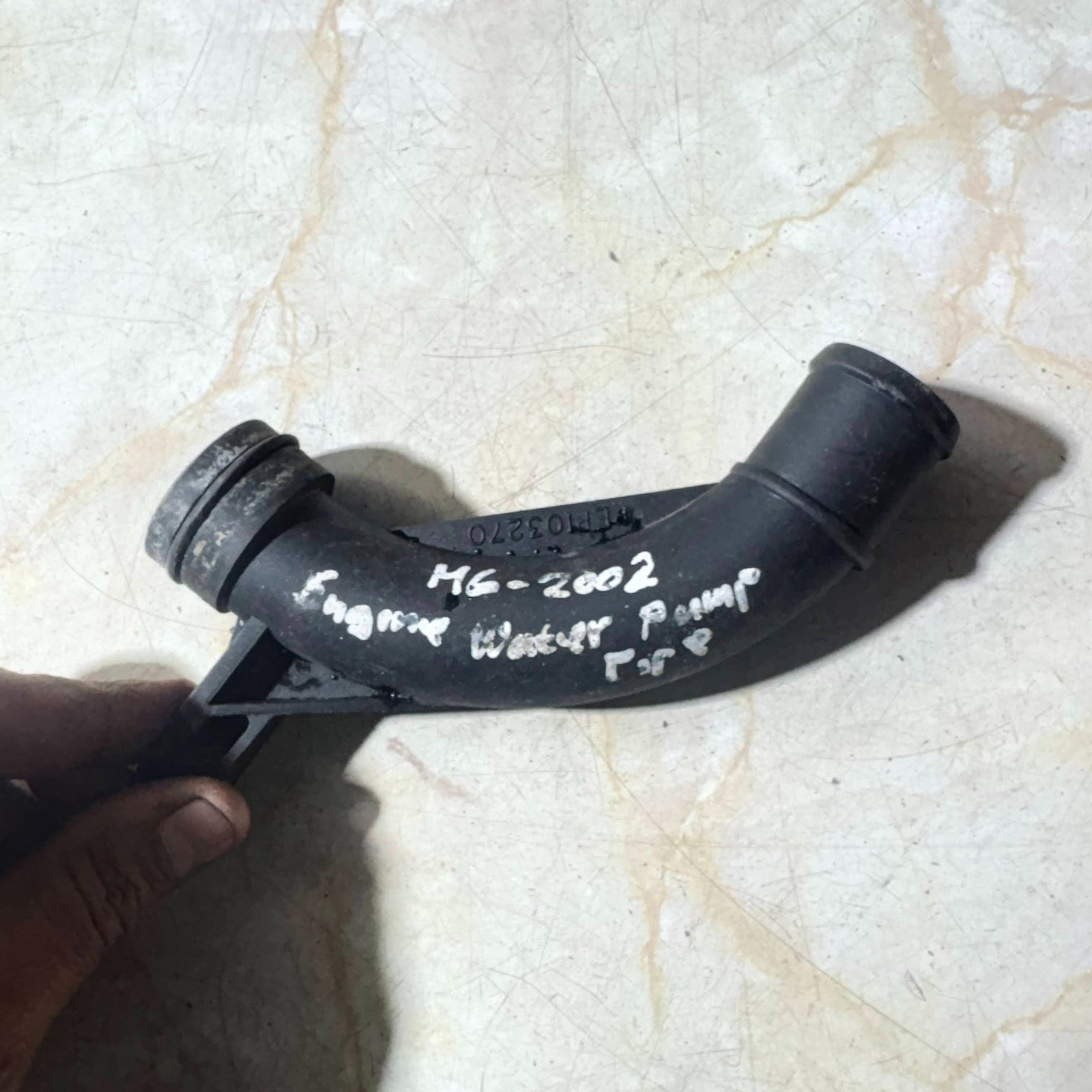 MG 2002 ENGINE WATER PUMP PIPE