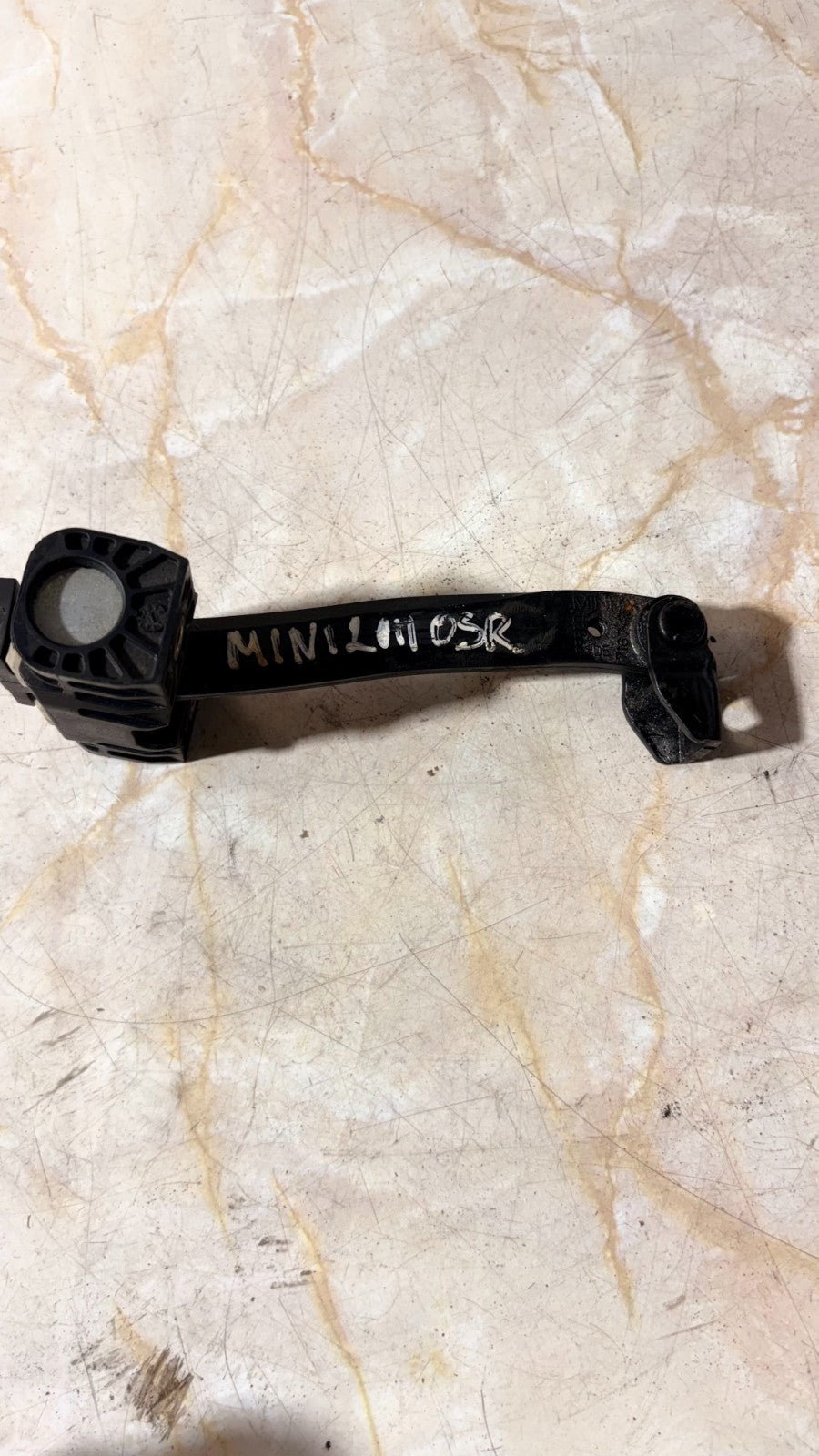 MINI 2011 DRIVER SIDE REAR DOOR CHECK STRAP STOPPER