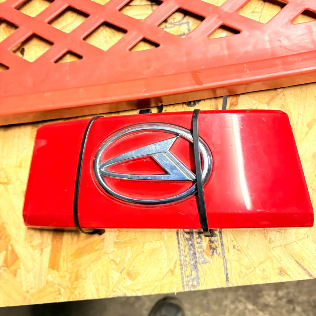 2005-10 Daihatsu Sirion MK2 Boot Tailgate Release Handle trim RED