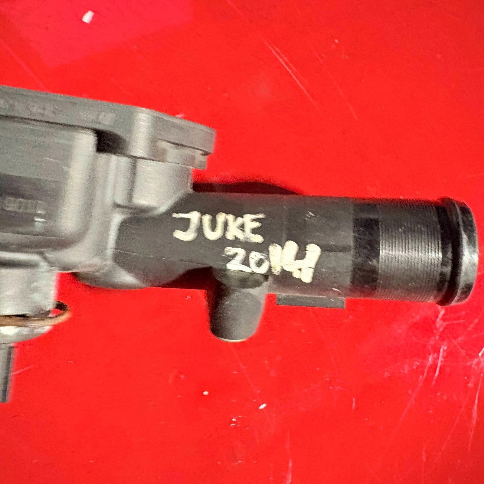 Nissan Juke 2014 thermostat housing 110609813R