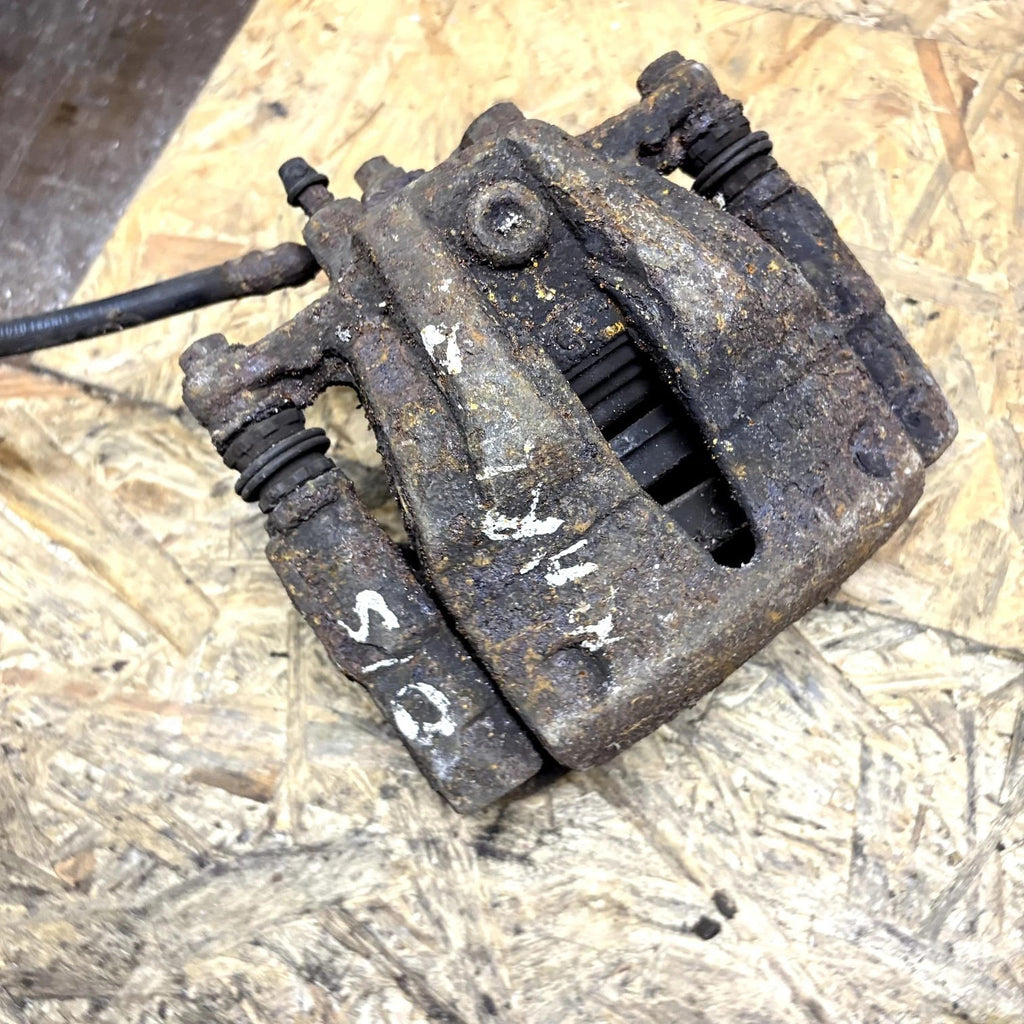 Nissan Note E11, NE11 Driver Side Brake Caliper 14390260